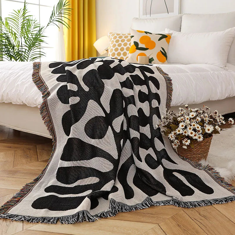 Klassische Strickdecke im Weinstock-Design für Stil und Komfort